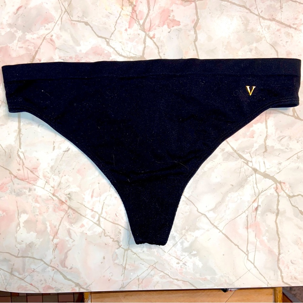 Brand new black Victoria’s Secret thong! Soft and stretchy! Size Large.